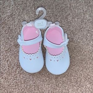 White baby shoes